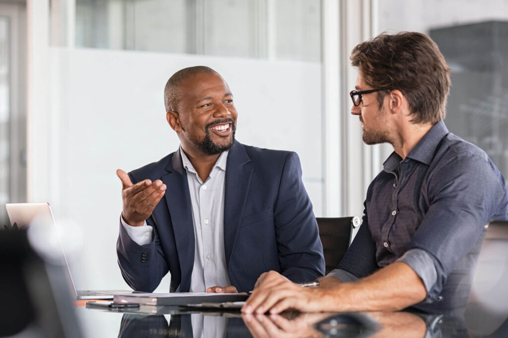 Executive leadership coaching session focused on guiding new executives through their first 90 days in a strategic business transition.
